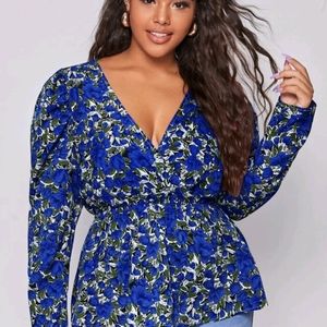 Peplum blue shirt with black and whit floral print